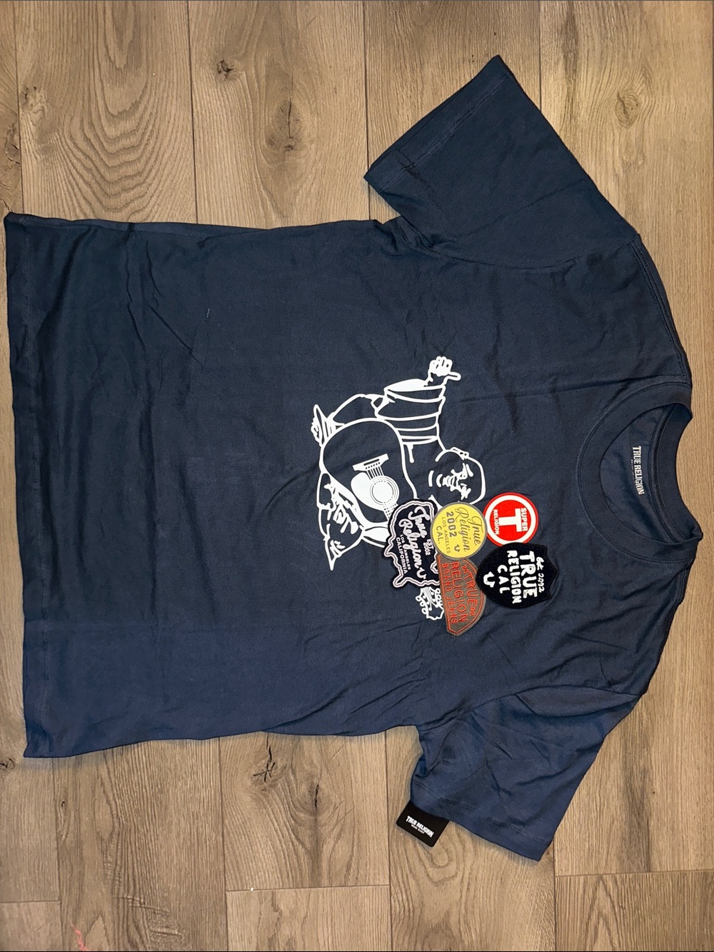 True Religion Navy Tee with White Guitar Graphic and Multi-Color Patches